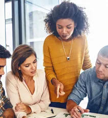 Team collaborating around a table