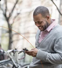 Man texting on a smartphone