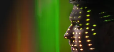 Man looking into ambient lighting