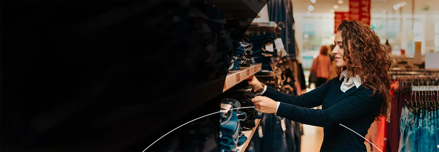 Woman looking at clothes banner image