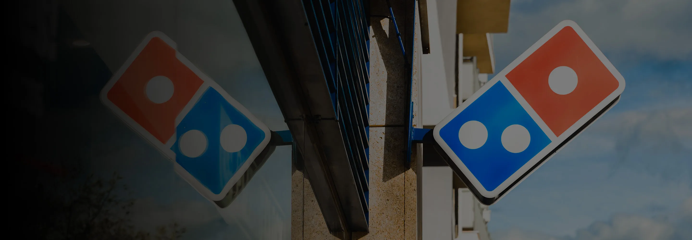 Dominos sign
