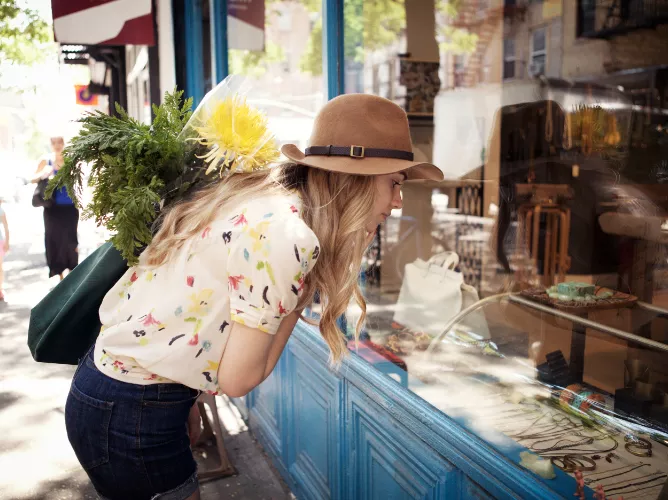 Woman looking at window display