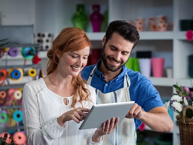 two business owners using retail analytics teaser