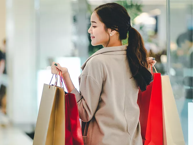 Woman shopping tile