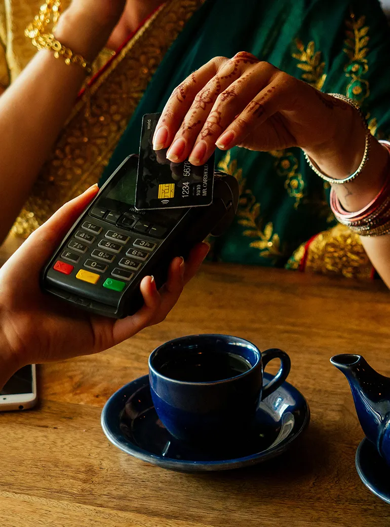 Woman using contactless payment