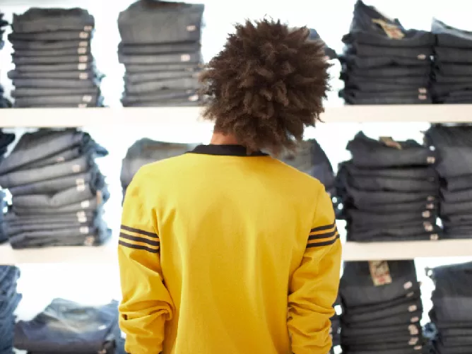 Young man shopping tile image