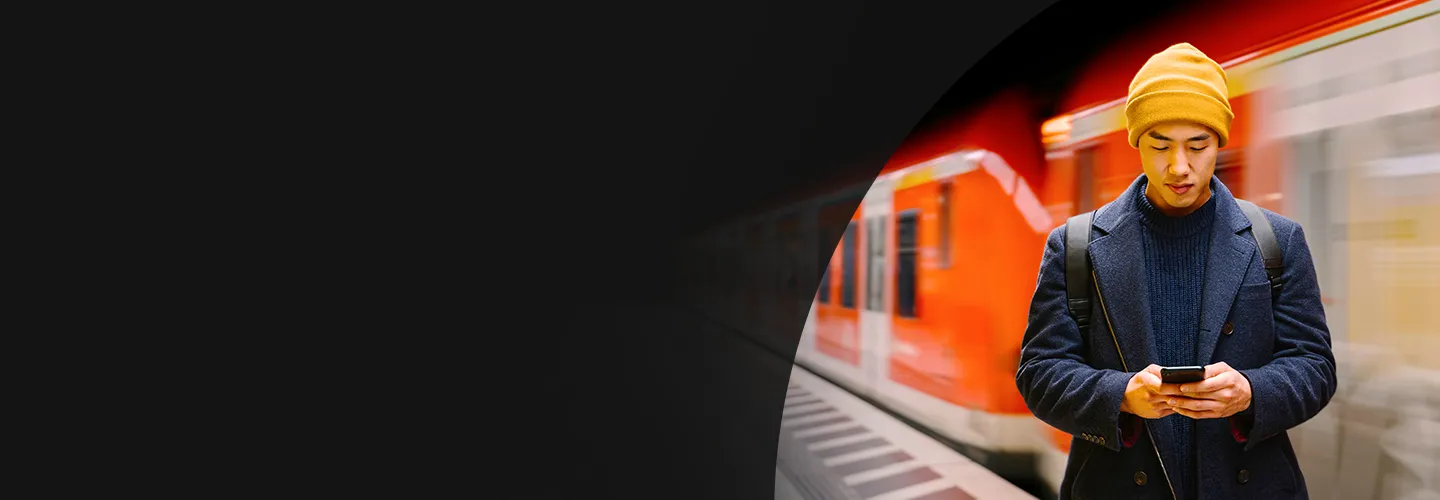 Man on phone with orange background