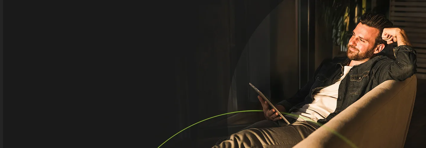 Man sitting in a chair smiling