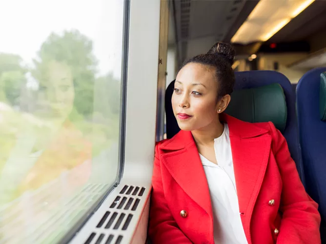 Woman looking out window